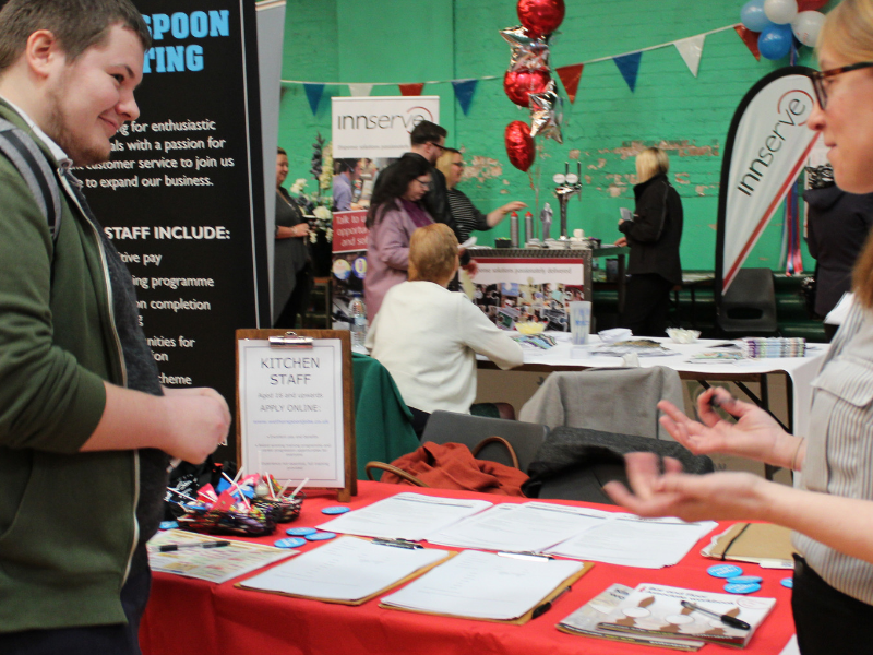Wetherspoon staff talking to customers at York Jobs Fair