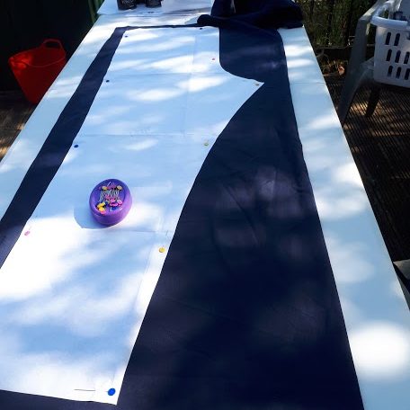 Fabric and the trouser pattern ready to be cut